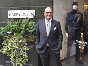In this Aug. 17, 2017 photo, Larry Rosen, CEO of Harry Rosen, poses at one of his high end mens wear stores in Toronto, Canada. Rosen fears the Canada-wide chain founded by his father will be one of the casualties when the North American Free Trade Agreement is renegotiated by Canada, the U.S. and Mexico. His company and many other Canadian retail stores are worried that proposed changes to custom duties will cause them to lose customers to the U.S., especially from U.S. online retailers. (AP Photo/Robert Gillies)
