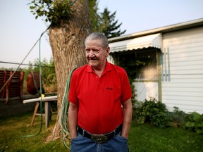 Rudy Prediger, 82, in his backyard at his home at Midfield Mobile Home Park.