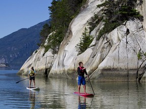 Stand-up paddle board in Howe Sound near Squamish, B.C.