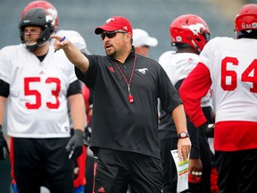 Calgary Stampeders offensive line coach Pat DelMonaco leads a recent practice at McMahon Stadium.