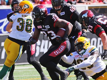 Calgary Stampeders running back Jerome Messam runs the all against the Edmonton Eskimos during the first half of the Labour Day Classic at McMahon Stadium, Monday September 4, 2017. Gavin Young/Postmedia