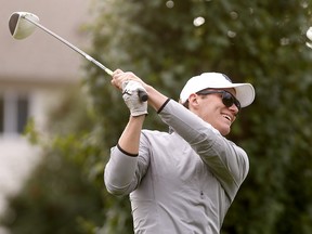 Matthew Tkachuk takes a swing during the Calgary Flames Celebrity Charity Golf Classic on Tuesday.