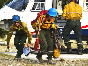 Helitack crews battle the Verdant Creek wildfire near the Alberta/B.C. border on Friday, Sept. 1 2017. Courtesy Parks Canada