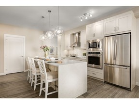 The kitchen in the Legacy 2 condo at Walden Place by Cardel Lifestyles.