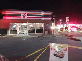 Responders at the scene of a police-involved shooting and fire at a 7-Eleven at 37th St. and Richardson Way S.W. on Friday, Sept. 29, 2017. BRYAN PASSIFIUME/Postmedia
