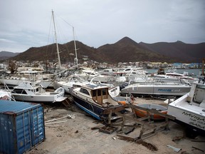 Wrecked boats in Geminga shipyard in Marigot, taken on September 9, 2017 in Saint-Martin island devastated by Irma hurricane.   Officials on the island of Guadeloupe, where French aid efforts are being coordinated, suspended boat crossings to the hardest-hit territories of St. Martin and St. Barts where 11 people have died. Two days after Hurricane Irma swept over the eastern Caribbean, killing at least 17 people and devastating thousands of homes, some islands braced for a second battering from Hurricane Jose this weekend.  MARTIN BUREAU/AFP/Getty Images