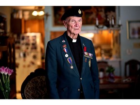 Father Bob Greene, an Anglican minister who fought in the Second World War, was photographed at his home in 2015.