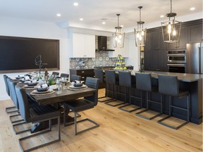 Kitchen and dining nook in the Bradley show home by Arcuri Homes in Carrington.