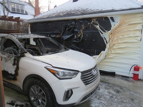 This white SUV was discovered on fire in an alley close to the shooting.