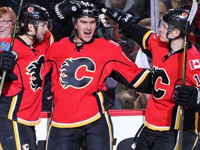 The Calgary Flames 3M line of Mikael Backlund (centre) Michael Frolik (left) and Matthew Tkachuk.
