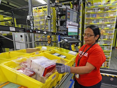 Packages are sorted inside the Amazon fulfillment centre in Brampton, Ont. There are four such facilities in the Toronto area.