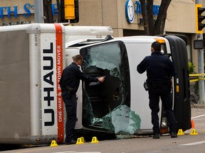 Police investigate after an officer was stabbed and pedestrians were run down Saturday in Edmonton.