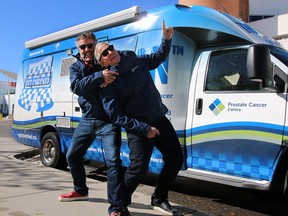 Brett Wilson and Bret Hart horse around while filming a public service message for Calgary's Prostate Cancer Centre on Oct. 3, 2017.