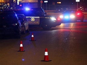 Calgary police investigate scene of drive-by shooting on 4th Street N.E. on Tuesday evening.