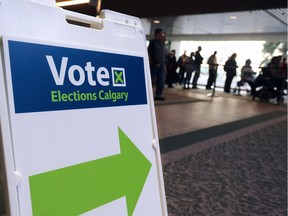 Voters line up to cast their ballots at city hall in the Oct. 16, 2017 municipal election.