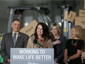 From left, Rocky County Reeve Greg Boehlke, Ashley Robinson, senior manager of public relations with Amazon Operations, speaks at the ground-breaking ceremony for a new Amazon fulfilment centre near Cross Iron Mills in Balzac, with Infrastructure Minister Sandra Jansen and Premier Rachel Notley on Thursday October 26, 2017.
