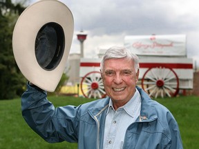 The voice of the Calgary Stampede chuckwagon races Joe Carbury waves goodbye in 2008 as he finished his long career.