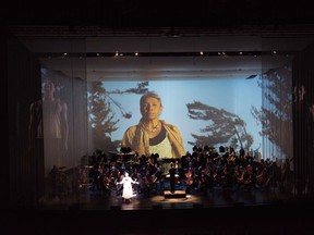 The National Arts Centre Orchestra is touring a show called Life Reflected. It celebrates the stories of four Canadian women — author Alice Munro, teen Amanda Todd, astronaut Roberta Bondar, and Mi'kmaw poet and elder Rita Joe —through music, film, photography, graphic design, and the written word. Fred Cattroll, Canadian Press