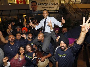 George Chahal celebrates with supporters after winning Ward 5 on Monday night.