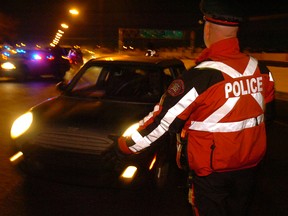Calgary police traffic unit conducts a Checkstop on Macleod Trail.