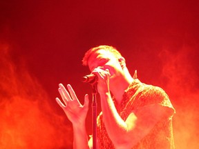 Imagine Dragons lead singer Dan Reynolds leads the band at the Saddledome in Calgary on Wednesday, October 11, 2017.