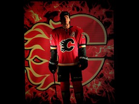 Calgary Flames Sean Monahan during player introductions before facing the Winnipeg Jets in the teams home opener in NHL hockey at the Scotiabank Saddledome in Calgary on Saturday, October 7, 2017. Al Charest/Postmedia