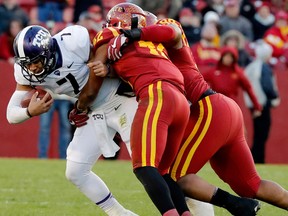 Linebacker Marcel Spears Jr. #42, and defensive lineman Vernell Trent #99 of the Iowa State Cyclones sack quarterback Kenny Hill #7 of the TCU Horned Frogs in the second half of play at Jack Trice Stadium on October 28, 2017 in Ames, Iowa. The Iowa State Cyclones won 14-7 over the TCU Horned Frogs.