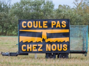 A sign protesting the TransCanada Energy East Pipeline Project that reads "Don't spill in our home" sits on a field near Highway 40 in the small town of Donnacona, 226 kilometres east of Montreal on Tuesday, September 29, 2015.