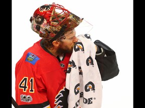 Calgary Flames goaltender Mike Smith during a break in play while facing the Winnipeg Jets in NHL hockey at the Scotiabank Saddledome in Calgary on Saturday, October 7, 2017. Al Charest/Postmedia