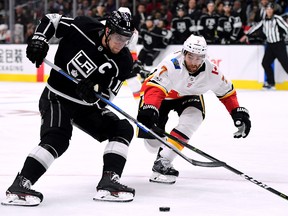 Anze Kopitar makes a move past T.J. Brodie during Wednesday night's game in L.A. Kopitar would score in the second period.