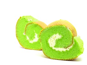 A pandan Swiss roll cake is pictured.