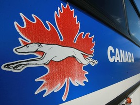 A Greyhound bus waits outside the terminal in Calgary.