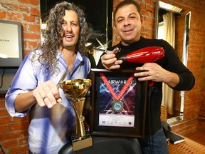 L-R Brothers David and Riccardo Costa from Alta Moda Hair Salon on 17th ave. S.W. in Calgary hold their Gold and Silver medals they won at the prestige OMC Hair World competion in Paris, France last week, a first for Canada on Tuesday October 10, 2017. Darren Makowichuk/Postmedia