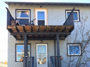 The front of a balcony in a southwest neighbourhood that left three men injured on Saturday, Oct. 14, 2017. Darren Makowichuk/Postmedia