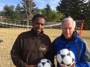 Jean-Claude Munyezamu, of Soccer Without Boundaries, left, and life skills coach Les Hewitt, author of The Power of Focus, meet with teen refugee every Saturday.