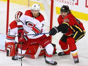 Jaromir Jagr fights for position with Hurricanes Jacob Slavin Thursday night. There wasn't a penalty on this play, but Jagr's teammates weren't so fortunate.