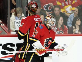 Calgary Flames goaltender Eddie Lack takes over for goaltender Mike Smith during game against the Ottawa Senators in NHL hockey at the Scotiabank Saddledome in Calgary on Friday, October 13, 2017.