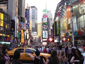 TIMES SQUARE, above, is everything that's tacky and wonderful about New York. That famous New York City skyline, below, with the distinctive spire of the 102-storey Empire State Building in the middle. photo by Steve McNaull, Special to 24 hours