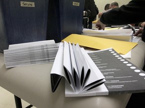 Ballots are prepared at a polling station in Calgary during the 2012 Alberta provincial election.