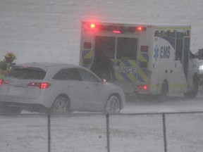 Police and emergency workers deal with a multi-vehicle collision on Metis Trail N.E. on Monday October 1, 2017. A blast of winter hit the city overnight. Gavin Young/Postmedia