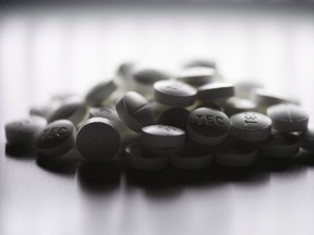 Prescription pills containing oxycodone and acetaminophen are shown in this file photo.