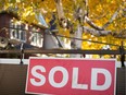 A real estate sold sign hangs in front of a west-end Toronto property,  Friday, Nov. 4, 2016. The Ontario Real Estate Association says it's time for higher fines for real estate agents that break the rules.The association is proposing that the fines for salespeople who violate a code of ethics double to $50,000.THE CANADIAN PRESS/Graeme Roy ORG XMIT: CPT106

Nov.4, 2016 file photo