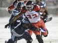 Stampeders running back Jerome Messam scores a touchdown against the Toronto Argonauts during the Grey Cup game Nov.  26, 2017.