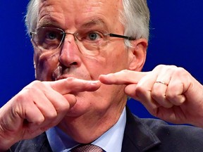 The EU's chief negotiator for Brexit Michel Barnier gestures during a speech to the German Employers' Associations on November 29, 2017 in Berlin.
