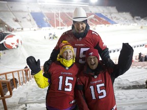 Richard Buckley and wife Lois Torfason along with their daughter Shannon cheer on son Calgary Stampeders quarterback Andrew Buckely as they take on the Winnipeg Blue Bombers during CFL action at McMahon Stadium in Calgary, Alta.. on Friday November 3, 2017. Leah hennel/Postmedia