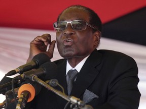 In this Nov. 1, 2017, file photo, Zimbabwean President Robert Muagbe addresses mourners at the Heroes Acre in Harare.