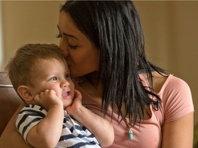 Sindy Rodriguez with her son Nathan at her Calgary home.