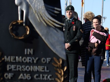 Calgarians pay their respects at the cenotaph during Remembrance Day ceremonies at the Military Museums in Calgary on  Saturday November 11, 2017.