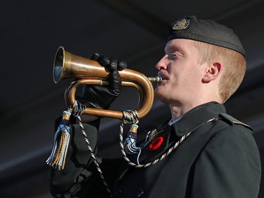 A bugler plays Last Post during Remembrance Day ceremonies at the Military Museums in Calgary on  Saturday November 11, 2017.
