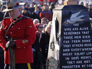 The honour guard stands at the cenotaph during the Remembrance Day wreath laying ceremony at the Military Museums in Calgary on  Saturday November 11, 2017.